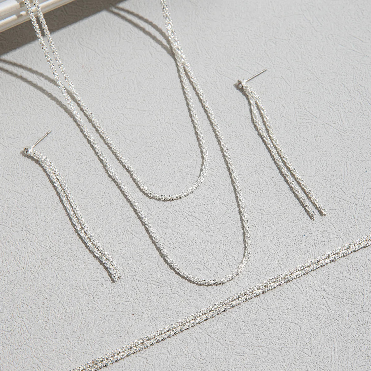 Set of Shiny Silver plated jewellery set with earrings & necklace