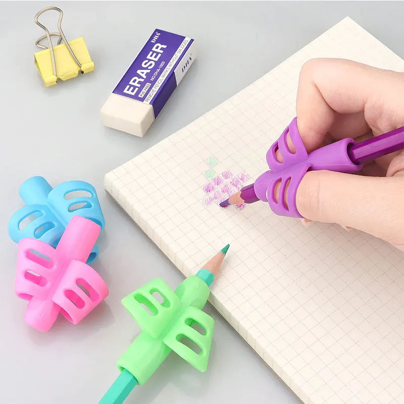 Tripod grip shaped Pencil gripper
